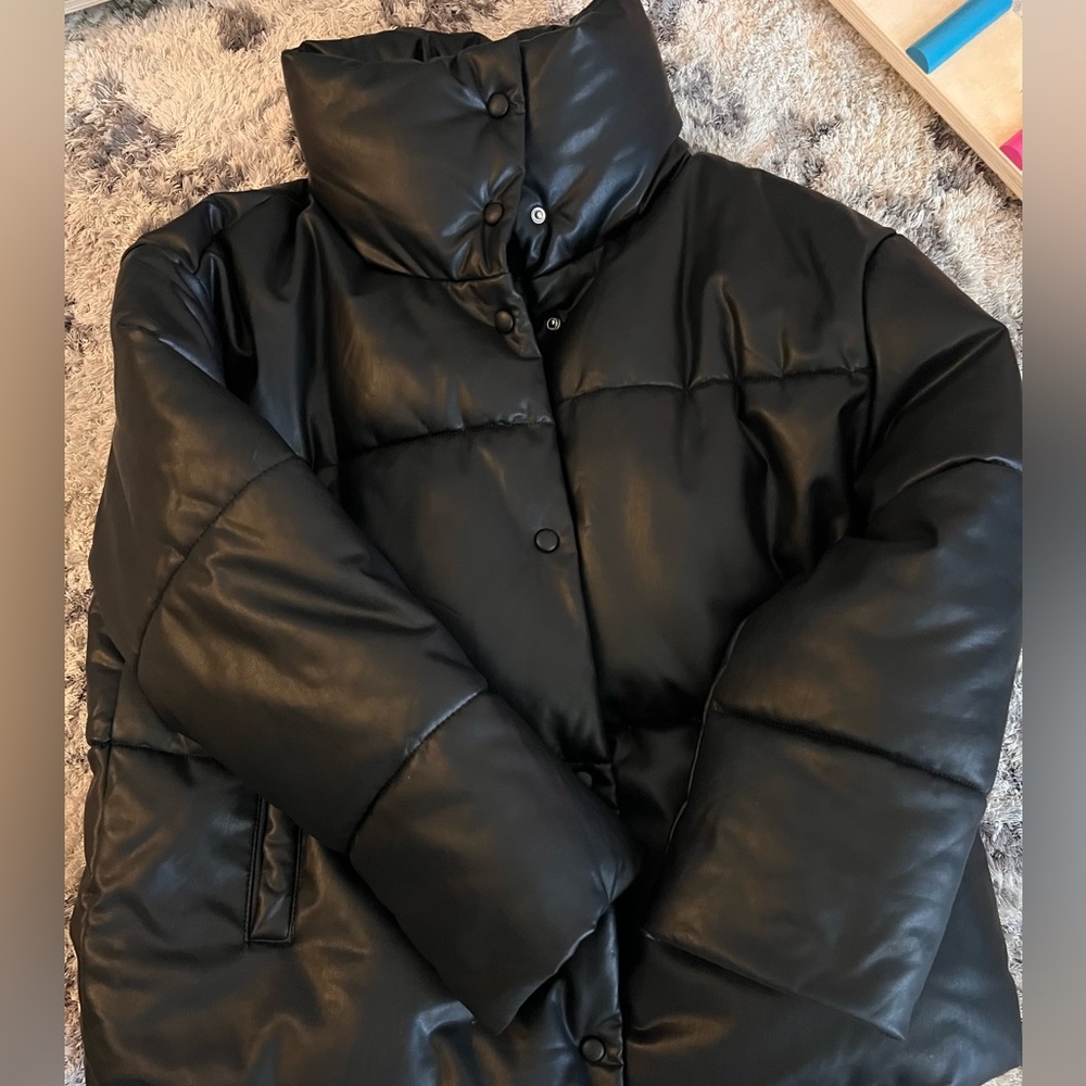 Bagatelle stylish black puffer jacket with high neck!